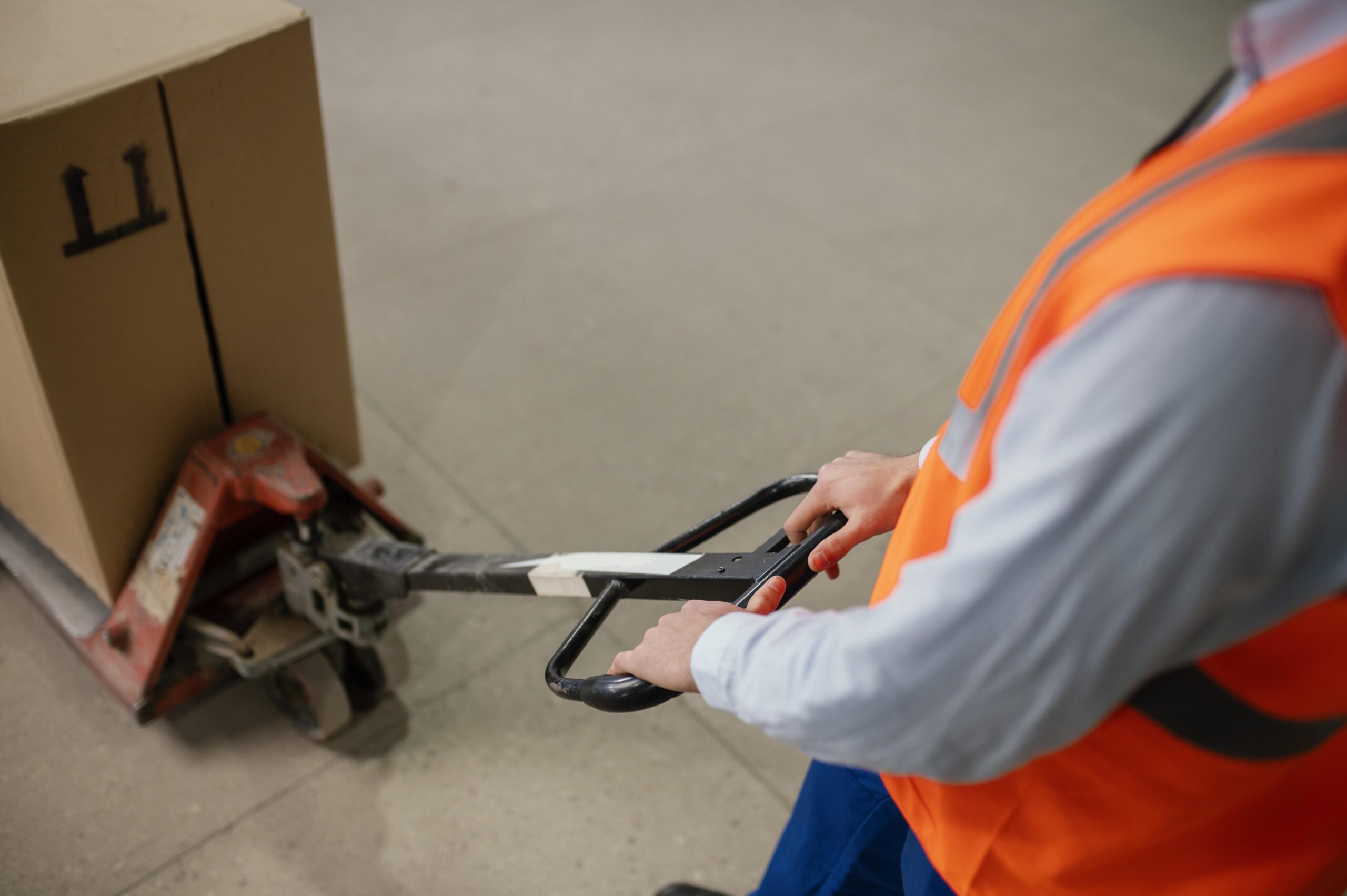 man working with heavy box
